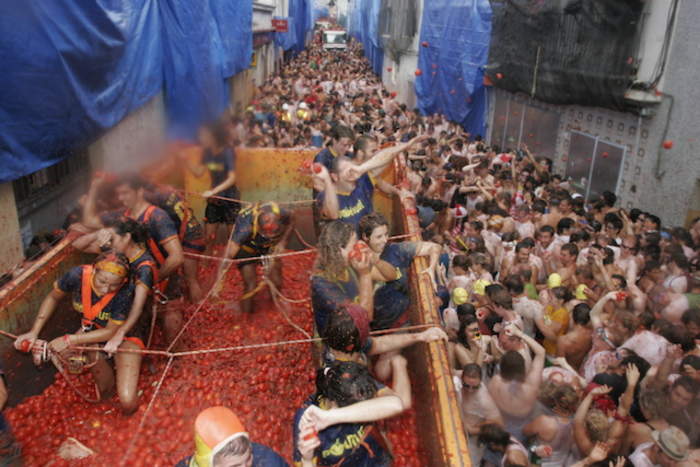 La Tomatina: Food fighting festival where people throw tomatoes at each other