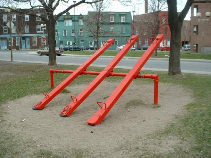 Seesaw: Long, narrow board pivoted in the middle, commonly used for play