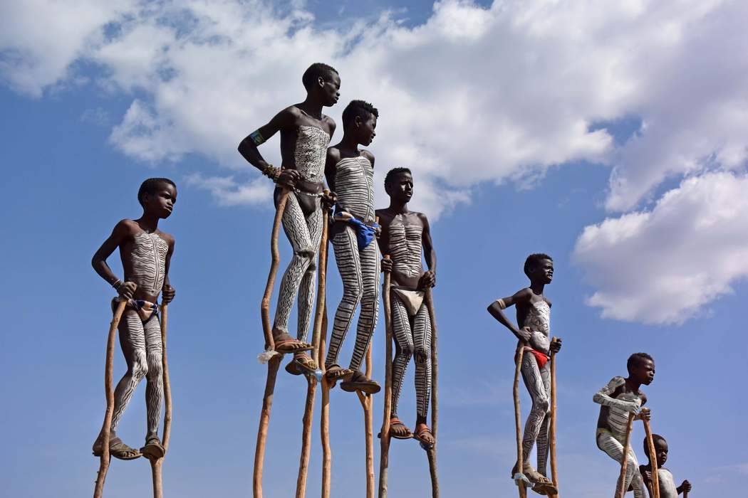 Stilts: Poles used for circus performance, pastime, or work